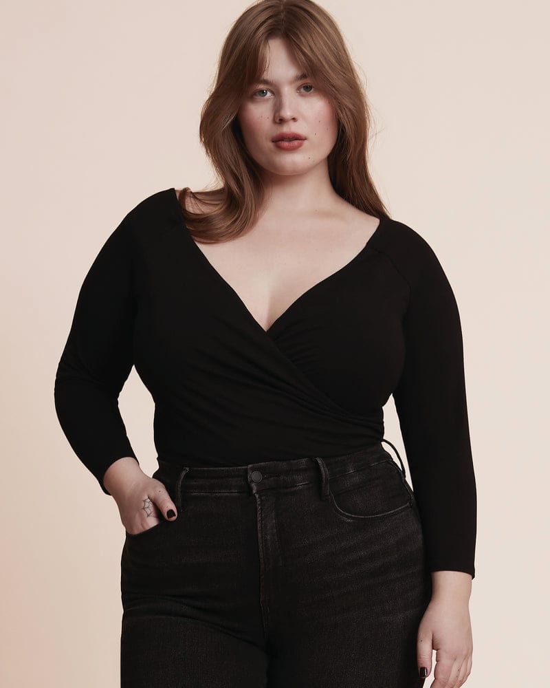 Plus size model wearing Jane Bodysuit by 11 Honoré Collection | Dia&Co | dia_product_style_image_id:199963